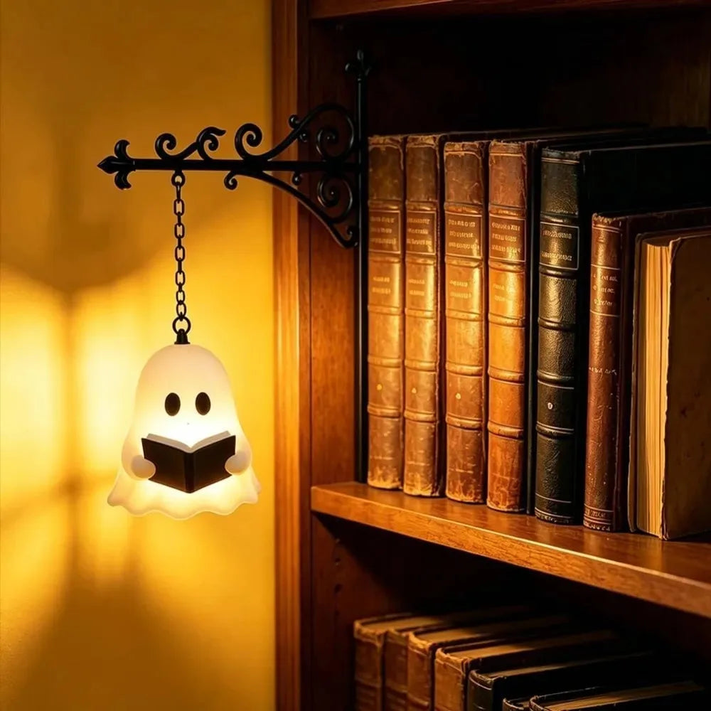 NookLamp Ghost hanging beside books